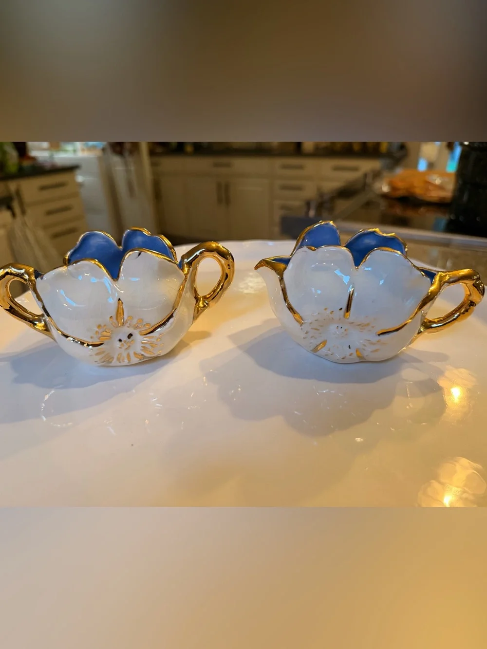 Vintage California Crafts porcelain flower-shaped sugar and creamer set.